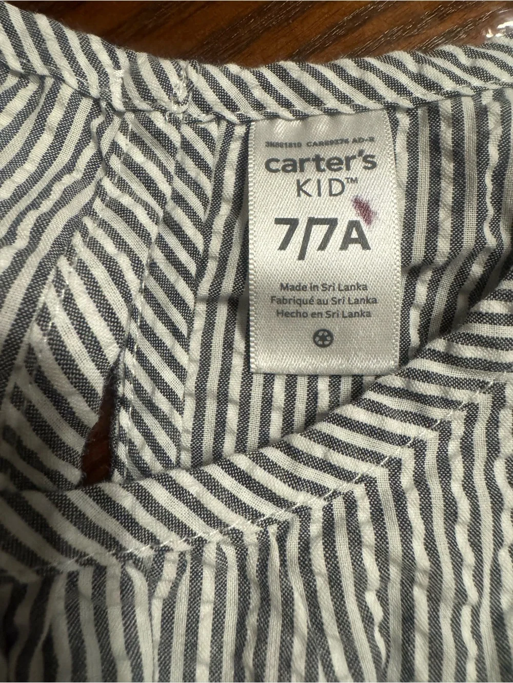 Lot of 2 Carter's Black Floral Smocked Romper and gray striped jumpsuit